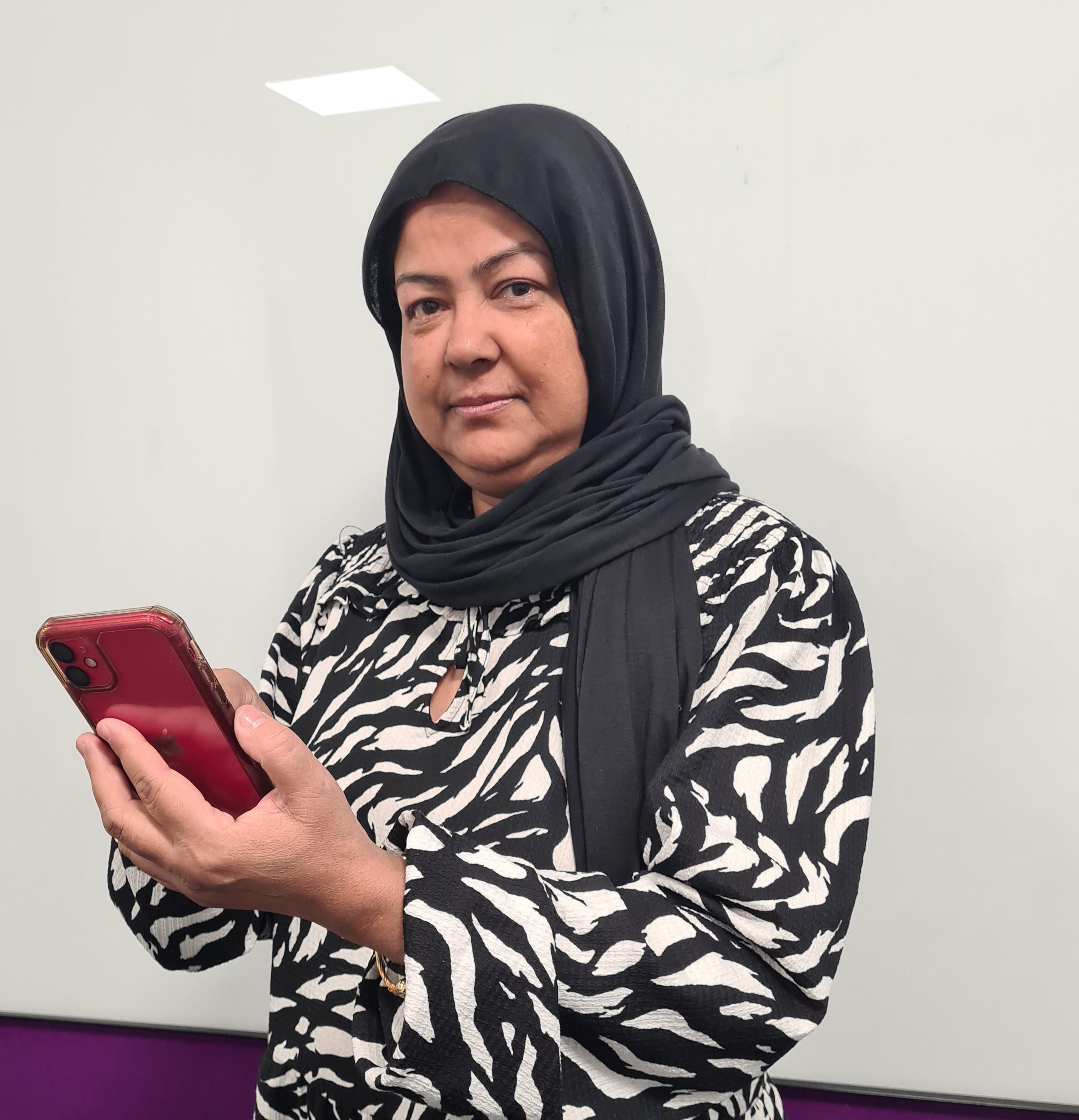 Councillor Syeda Khatun using the healthy ageing app