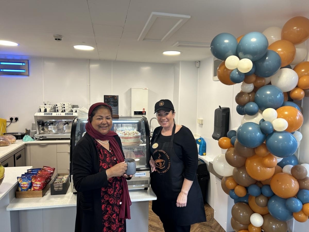 Councillor Syeda Khatun with a member of staff in the new cafe