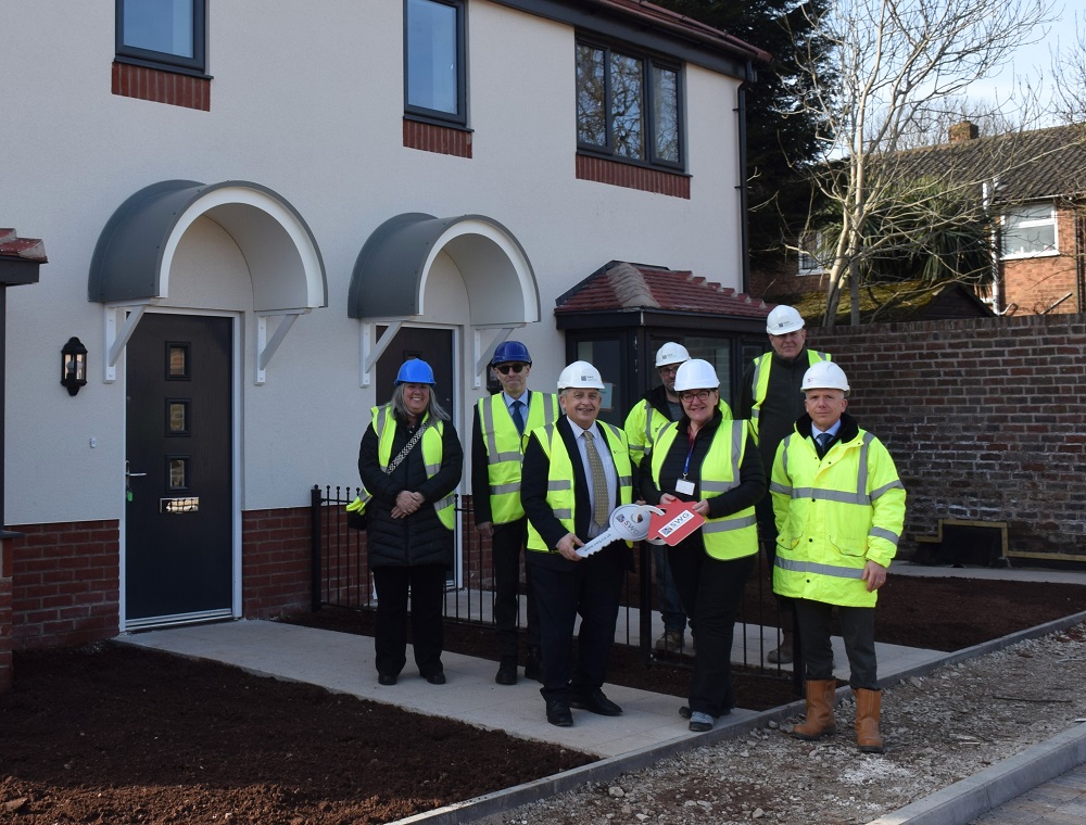 New homes in Whitgreave Street, West Bromwich, with representatives from Sandwell Council and SWG Construction