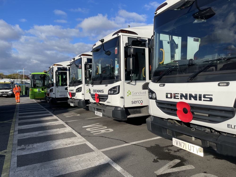 Serco waste vehicles with poppies