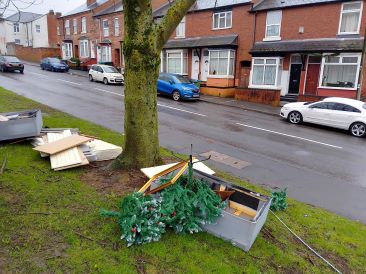 Fly-tip items dumped on grass area