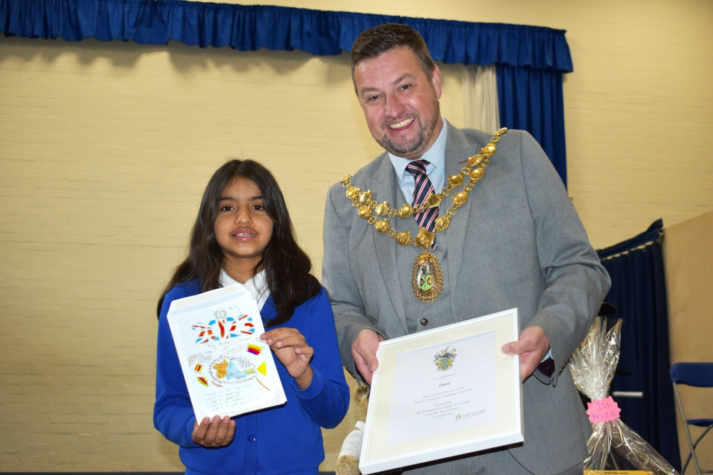 King's Coronation Card competiton winner - Zara, aged 10, St Martin's CofE school with Mayor of Sandwell Richard Jones