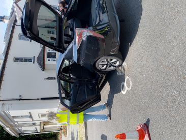 Vehicle being inspected by Enforcement Officer as part of road safety traffic operation