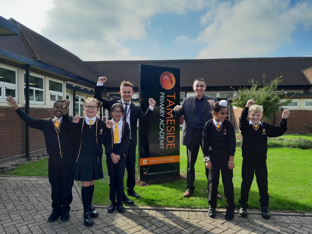 Sport Centre of Excellence Prompts New Legacy for Tameside Primary Academy - Mr Hill and Cllr Hackett with students at Tameside Primary Academy